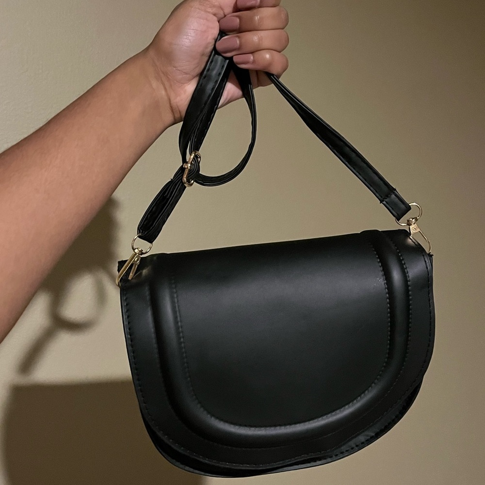 Small black handbag with black detailing